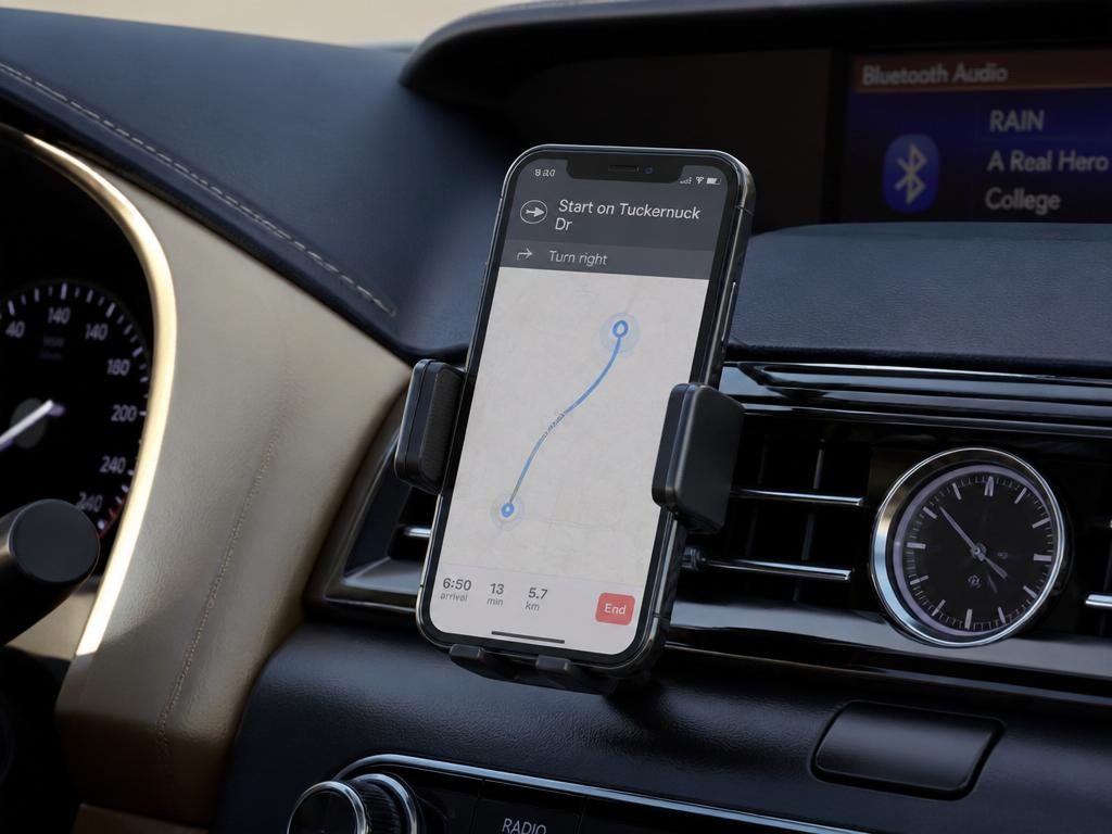 Car dashboard mount holding a device showing a map route